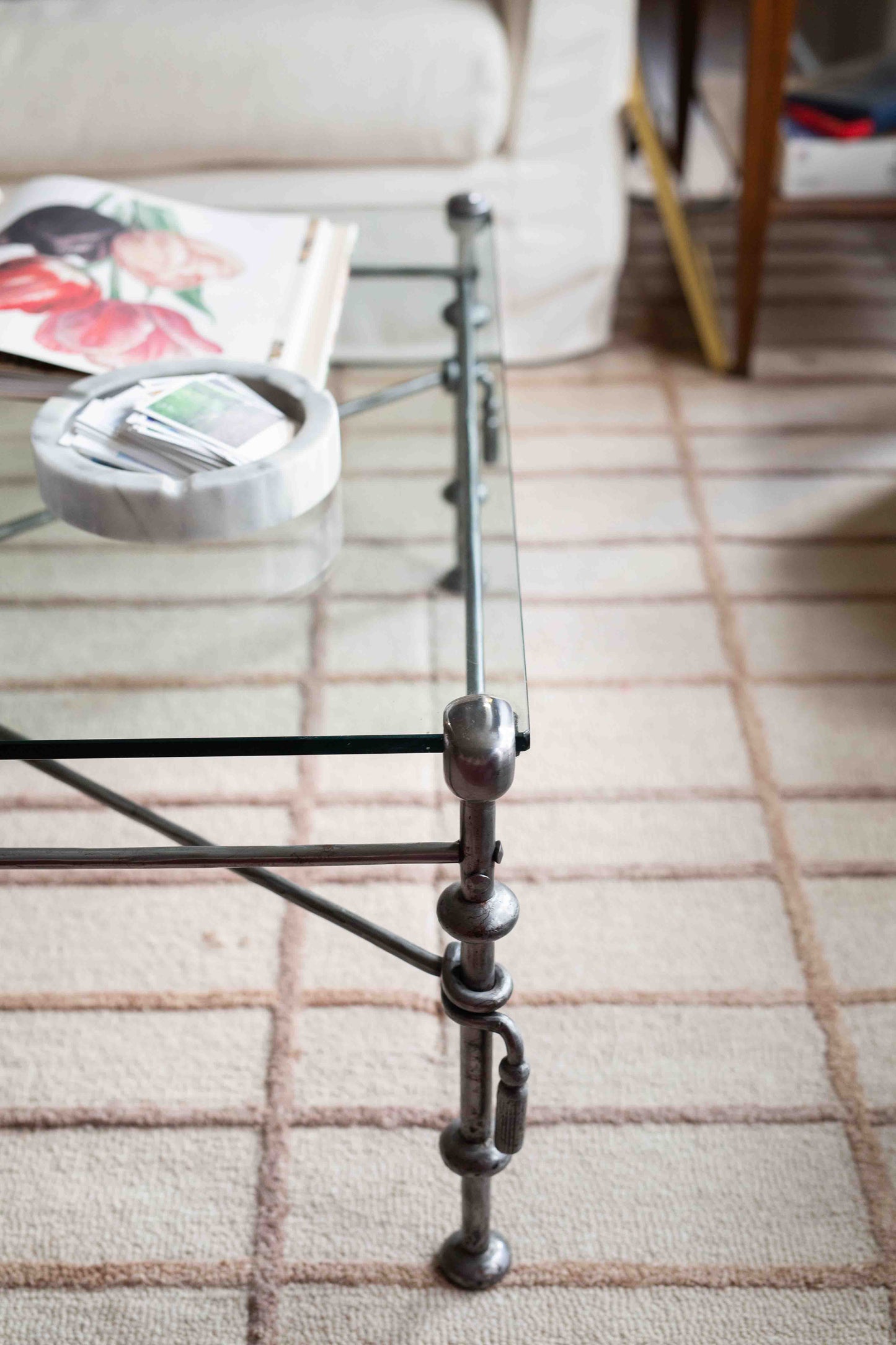 Giacometti-style wrought iron and glass coffee table
