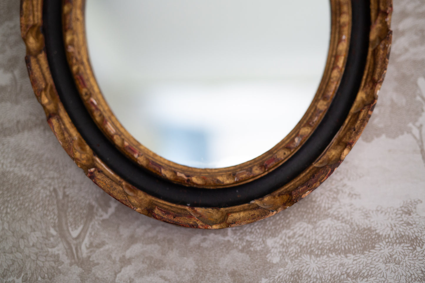 Black and Gold Gilt Oval Mirror