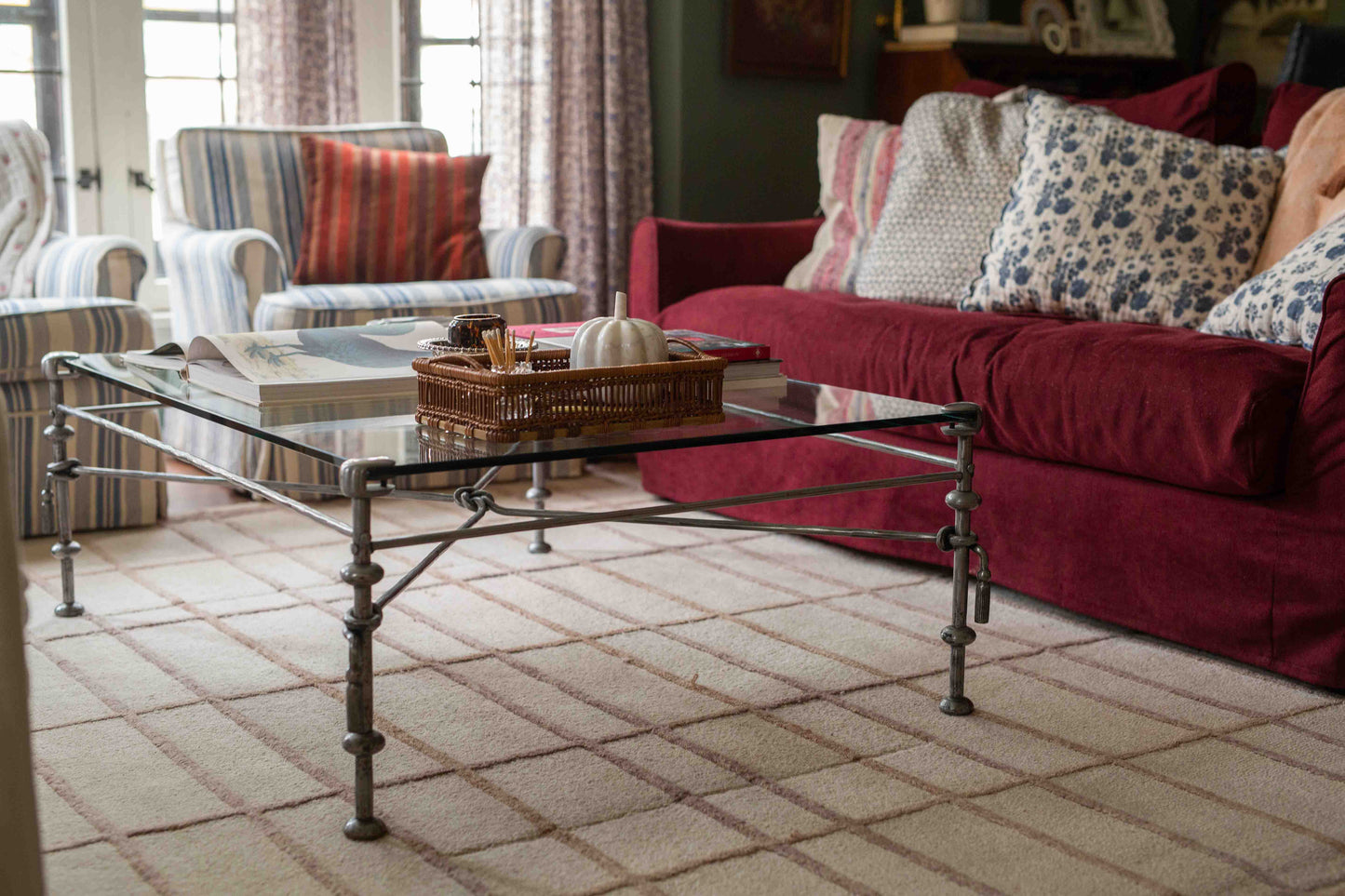 Giacometti-style wrought iron and glass coffee table