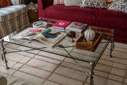 Giacometti-style wrought iron and glass coffee table