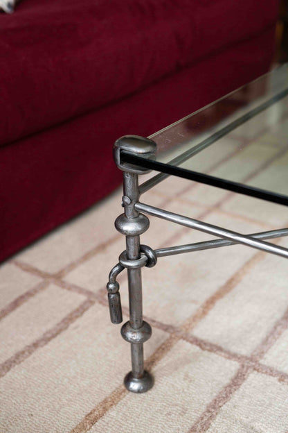 Giacometti-style wrought iron and glass coffee table