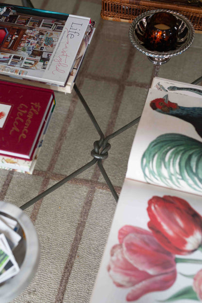 Giacometti-style wrought iron and glass coffee table