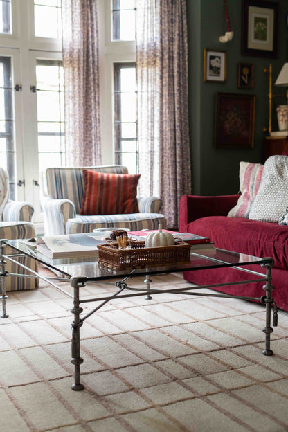 Giacometti-style wrought iron and glass coffee table