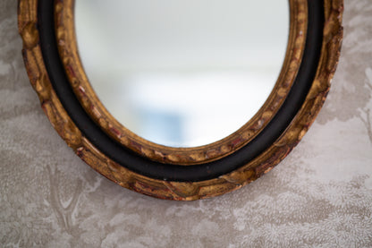 Black and Gold Gilt Oval Mirror